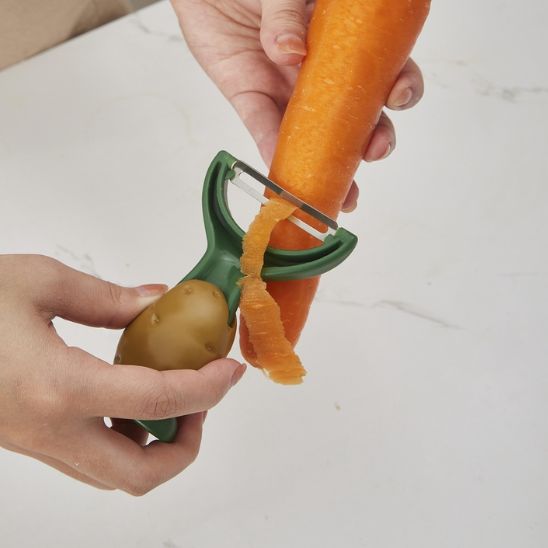 EPLUCHEUR - EN FORME DE PATATE SOURIANTE