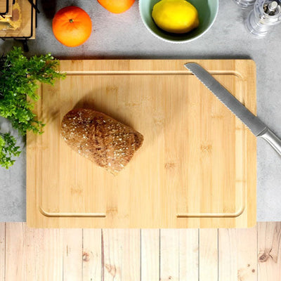 Planche à découper en bois en bambou servant à couper du pain et à préparer des fruits frais
