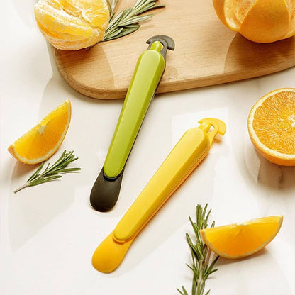 Éplucheur- Epluche orange- Epluche agrumes à deux couleurs , outil pratique pour peler les oranges et autres fruits similaires.