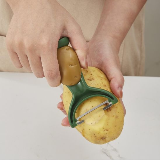 EPLUCHEUR - EN FORME DE PATATE SOURIANTE