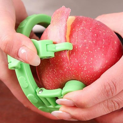 Éplucheur à pommes avec système de fixation sécurisé, lame rotative et bras de maintien réglables sur plan de travail