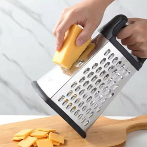 Râpe à fromage multifonctionnelle utilisée en cuisine