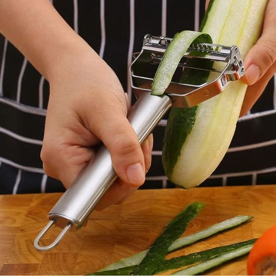 râpe à légumes manuelle professionnelle en inox épluche courgette et légumes